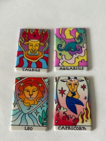 B68, 4 pendentifs signes astrologiques recto verso