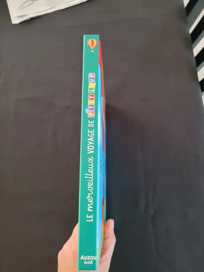 Livre le merveilleux voyage de p'tit loup auzou éveil volets - photo numéro 2
