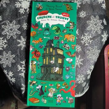 Livre neuf cherche et trouve . Livre en relief