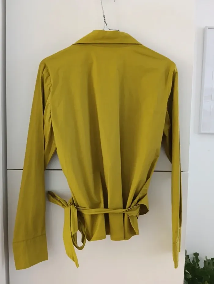 Blouse cache coeur vert olive
La fée maraboutée
Taille 40 - photo numéro 8
