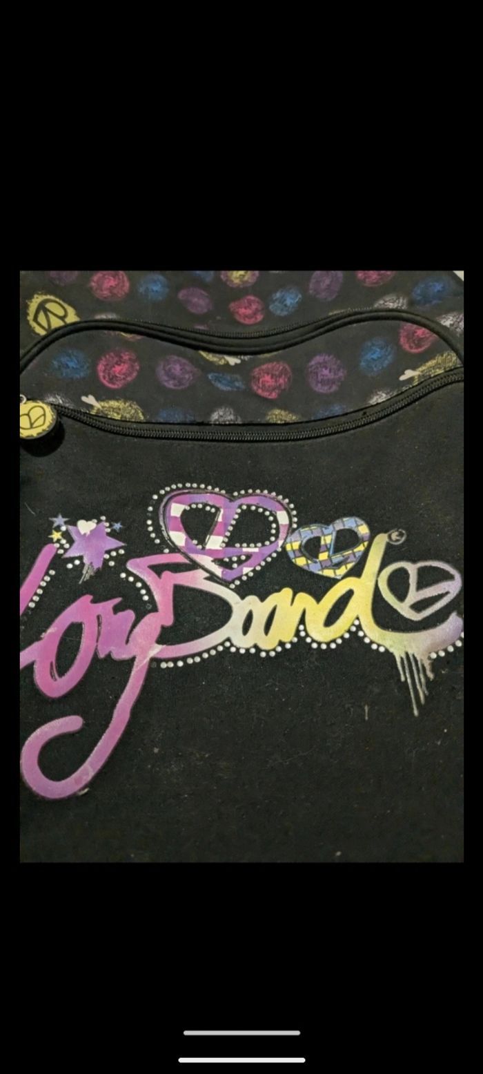 Cartable, sac à dos scolaire noir et multicolore. - photo numéro 3