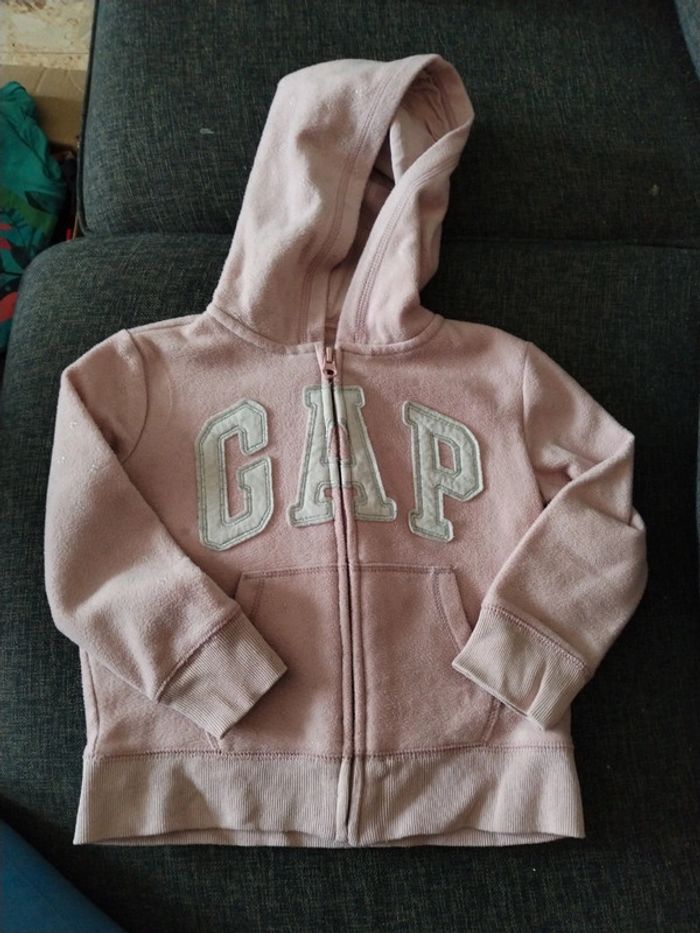 Gilet a capuche