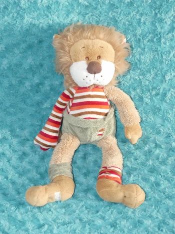 Doudou lion marron clair vert Bukowski 39 cm , tbe