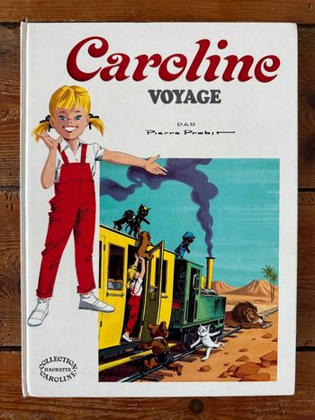 Très bon état - Grand livre ancien vintage Caroline voyage Pierre Probst blanc Hachette