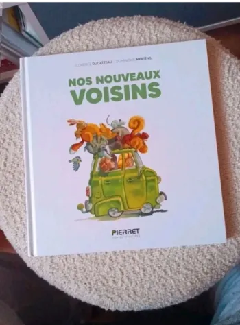 Joli livre nos nouveaux voisins très bon état