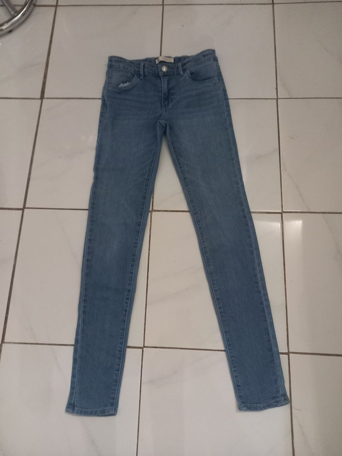 Levi,s fille taille 14 ans couleur bleu clair tres bonne etat - photo numéro 8