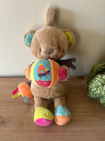 Doudou peluche ours beige balle oiseau musical simba toys