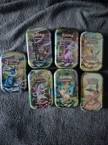 7 mini tins évolutions prismatiques 8.5 fr scellé 