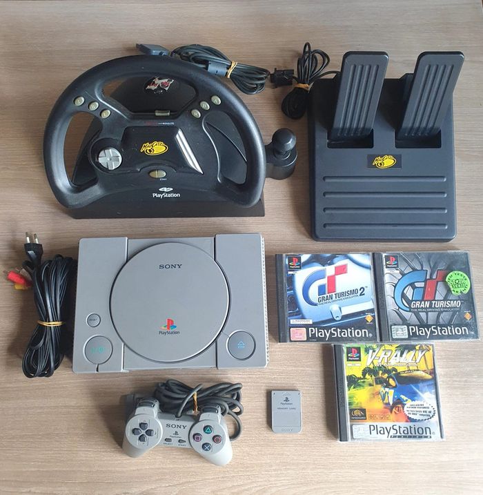 Lot Console PlayStation 1 PS1 + 1 Manette Officielle + 1 Volant + 1 Carte Mémoire & 3 Jeux