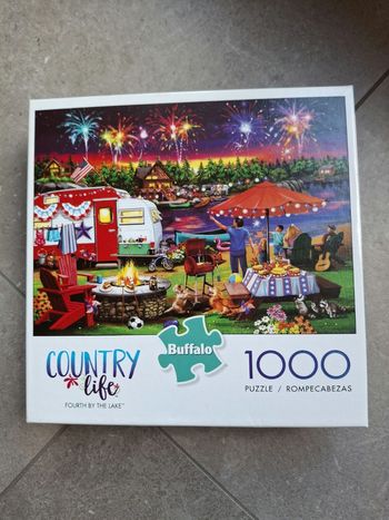 Puzzle Buffalo 1000 pièces "Fourth by the Lake"