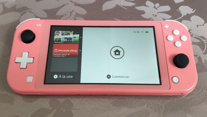 Nintendo Switch lite rose corail