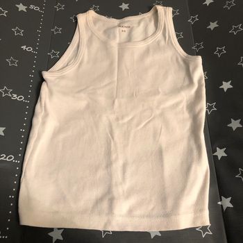 Débardeur blanc tex 4-5 ans