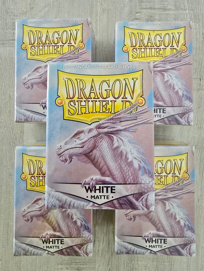 Lot de 5 paquets de 100 sleeves Dragon Shield Blanc Matte