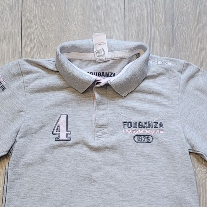 Polo gris. Fille ou garçon 8 ans. Marque Oxylane - photo numéro 2