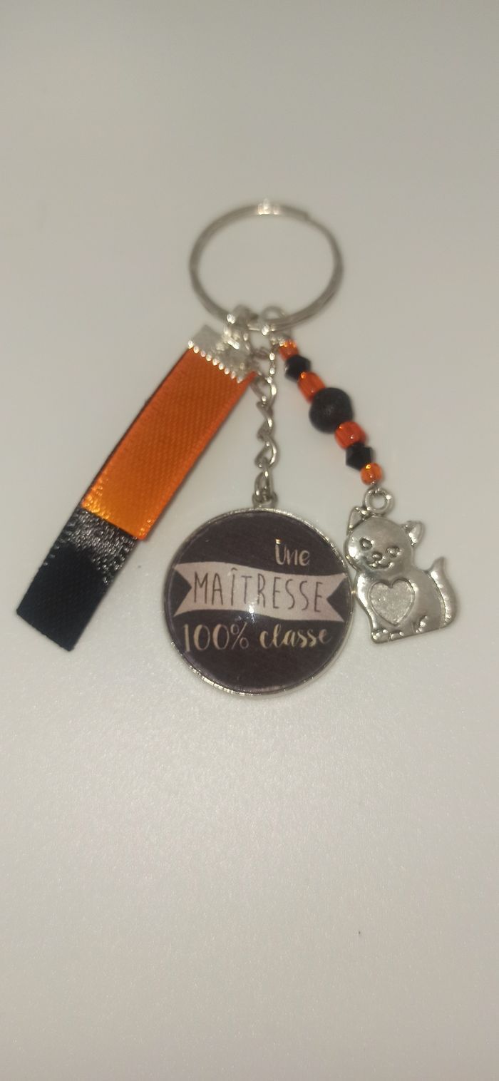 Cadeau maîtresse, porte clé message bijoux de sac " Maîtresse 100%classe"