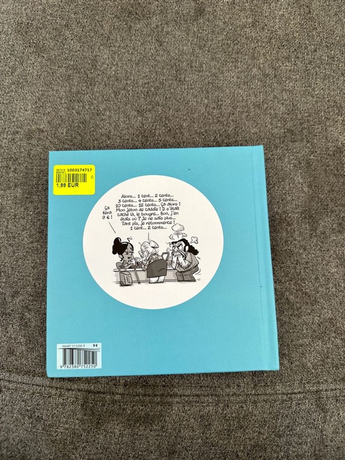 Livre au grand magasin - photo numéro 3