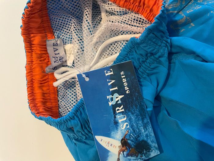 Short de bain bleu taille 6 ans survive sport - photo numéro 3