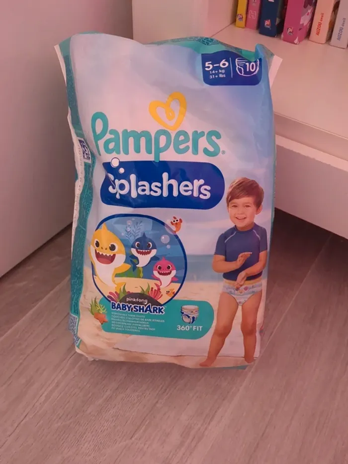 Lot 9 couches de bain 14kg et plus pampers