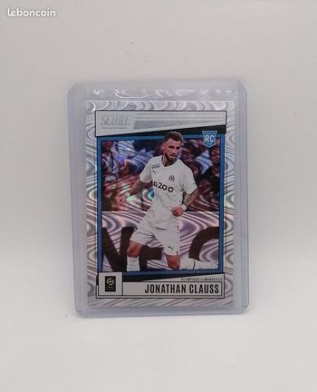 Carte Panini score Ligue 1 2022-23 Rookie Card Swirl Jonathan Clauss n°96.
