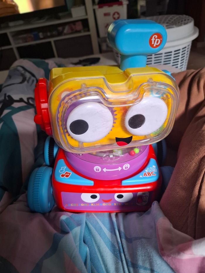 Robot fisher price roule chante et se demonte