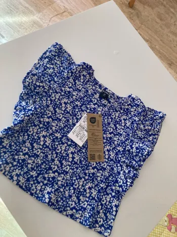 T-shirt bleu fleuri 4ans