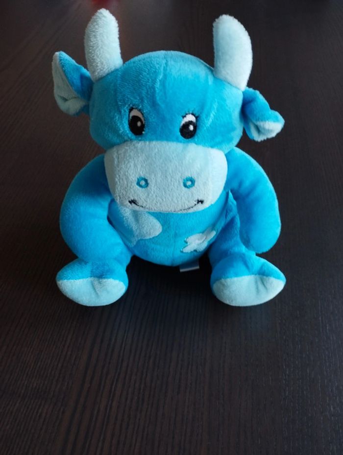 Peluche vache avec grelot à l'intérieur