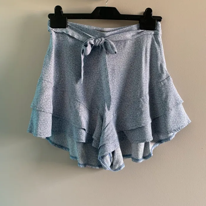 Short fluide à volants
