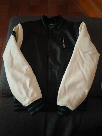 Veste en faux cuir taille 8ans