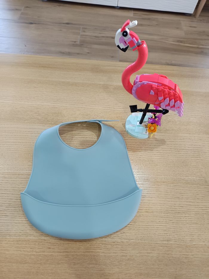 Bavoir à réservoir