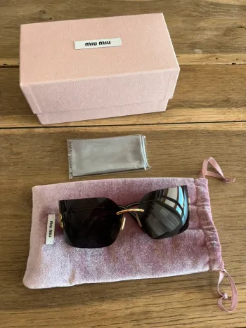 Lunettes de soleil Miu Miu MU 54YS