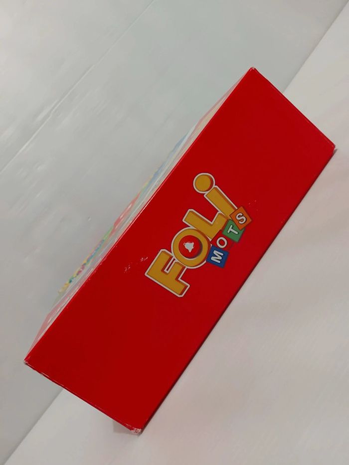 Jeu de société évolutif "Foli Mots" jeu en très bon état mais boîte un peu abîmée - photo numéro 12
