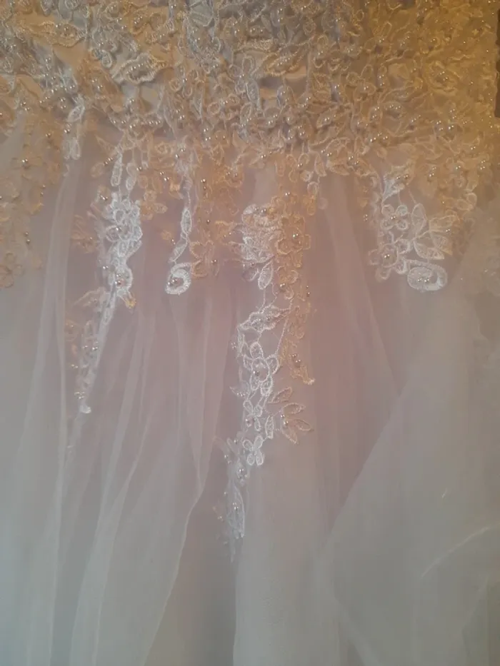 Robe de mariée lacées perle - photo numéro 3