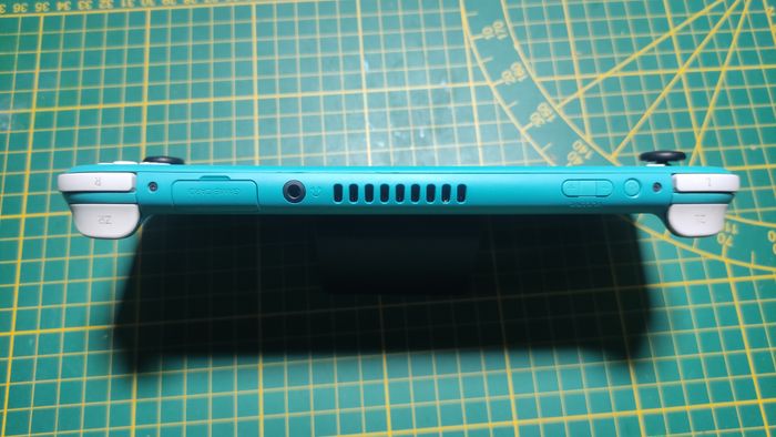 Nintendo Switch Lite Turquoise - Très bon état - photo numéro 6