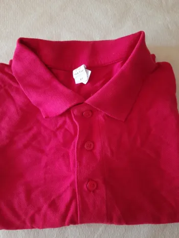 Polo manches courtes taille M. Tbe