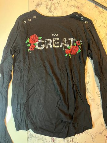 Pull  noir à motif neuf