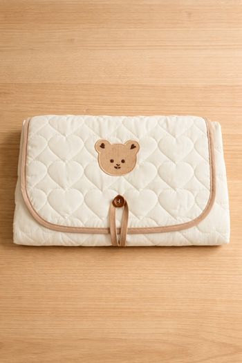 Tapis à langer nomade – Pratique & confortable