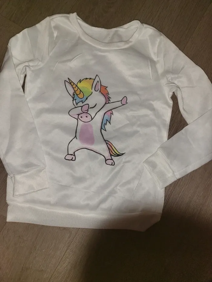 Pull licorne taille Xs