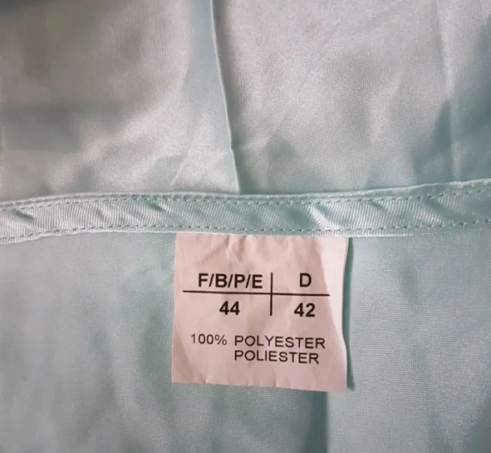 Jupe satinée bleu clair. T 44 Neuve. - photo numéro 3