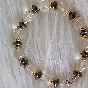 Bracelet composé des perles transparente gravée