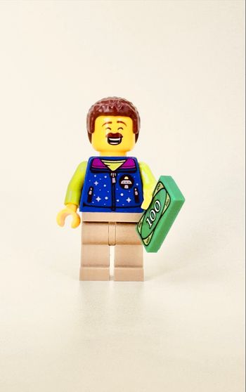 Lego Figurines City : Animateur (visage double expression) du Manège de l’Espace - NEUF
