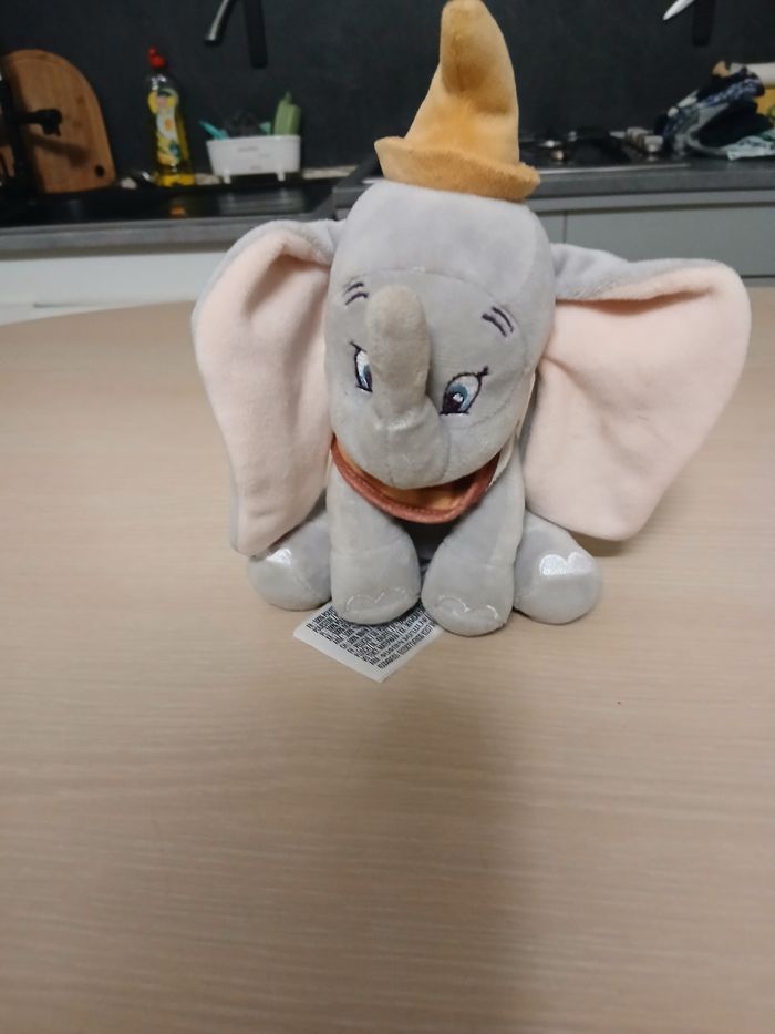 Peluche disney 12cm matiere polyster  couleur gris,rose,moutarde - photo numéro 7
