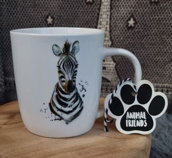 Tasse blanche avec zèbre