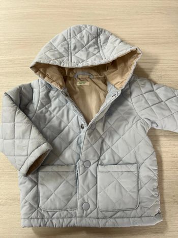 Doudoune Benetton bleu claire 6/8 mois