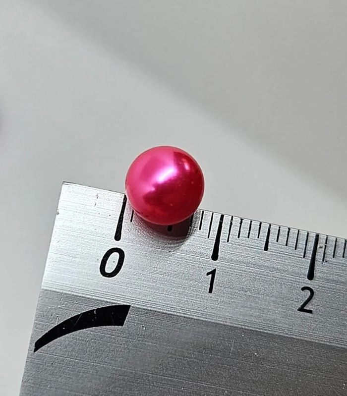 Paire de boucles d'oreilles.
Neuve.