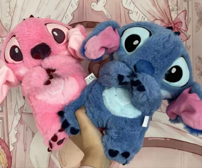 Peluche Stitch ou Angel 28 cm lumineuse , respire, fait plusieurs mélodies 4 modes différents NEUF