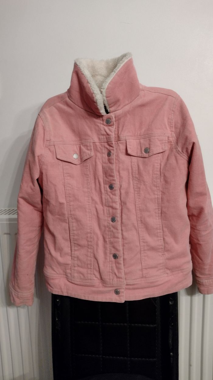 Veste chaude en velours rose.
