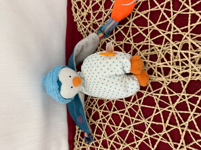 Porte-tétine éducatif « Pingouin » Spiegelburg