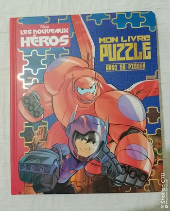 Disney les nouveaux héros Livre puzzles 50 pièces
