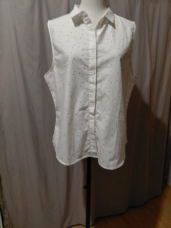 Très jolie blouse sans manches femme T 46