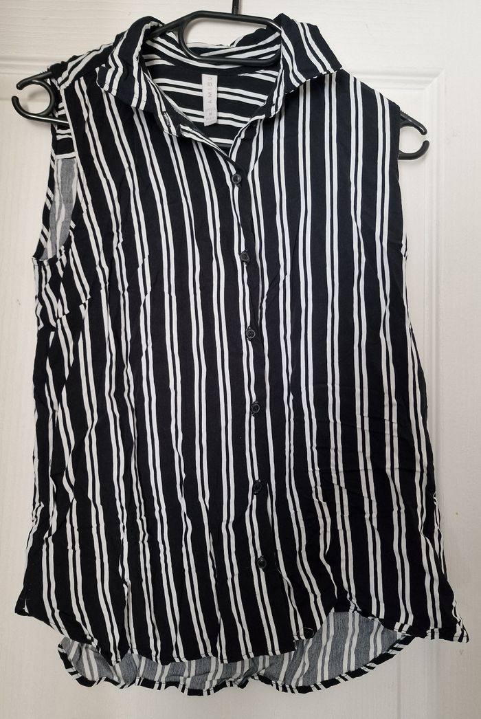Chemise sans manches neuve 38